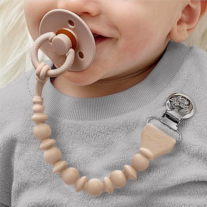Itzy Ritzy Silicone Pacifier Clip; 100% Food Grade Silicone Pacifier Strap with Clip Keeps Pacifiers, Teethers & Small Toys in Place; Features One-Piece Design & Cord (Toast)